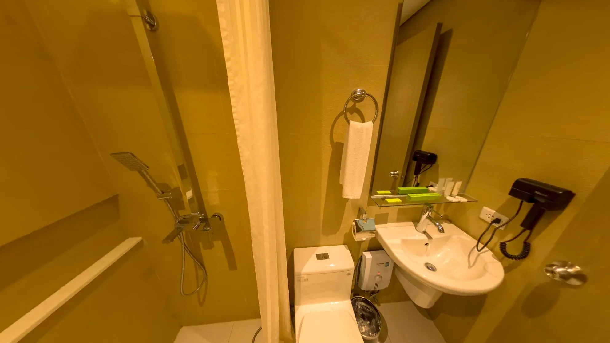 Studio Twin Room bathroom with a shower, towel ring and vanity